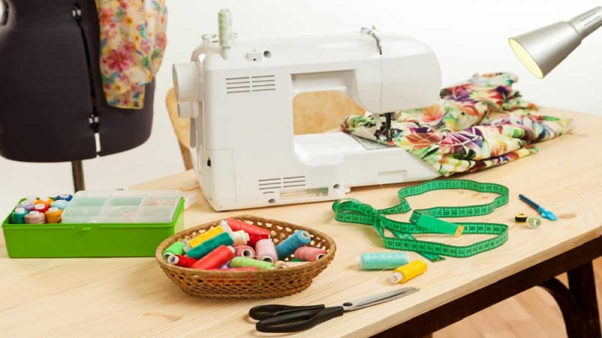 A sewing machine and accessories on a table